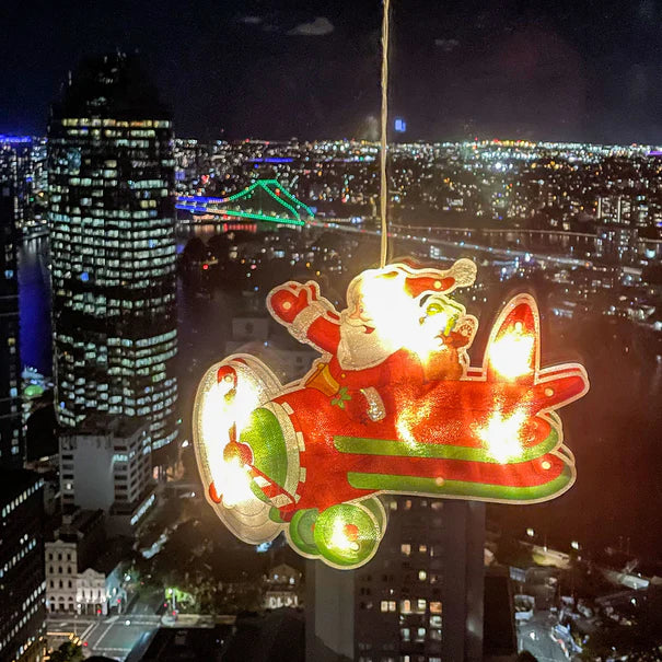 Light up Santa in Plane Window Sign with Suction Cup